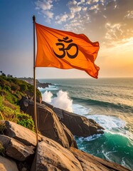 Orange flag with om symbol on cliff overlooking waves