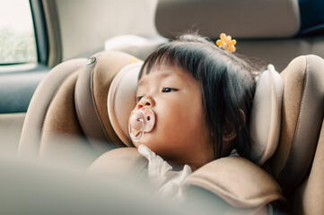 Quiet reflection young girl in car seat family vehicle candid moment cozy interior child perspective