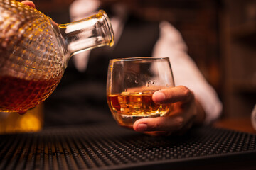 Businessmen in suits drinking Celebrate whiskey	