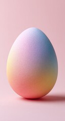 Colorful easter egg on pink background studio shot for creative projects