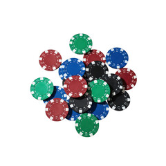 Overhead view of a scattered pile of red, blue, green, and black poker chips on a dark surface
