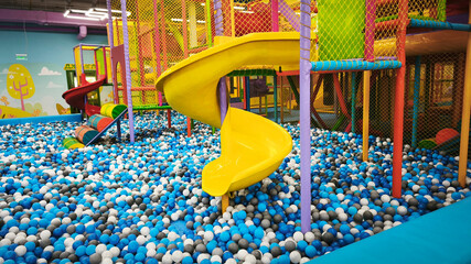 Children's entertainment area, a bright playground with safe climbing frames, colorful obstacles...