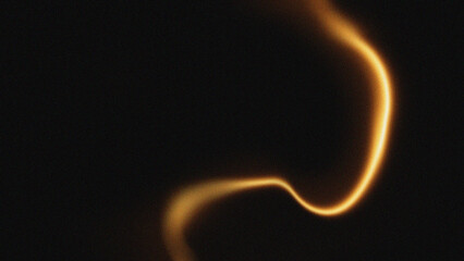 Abstract golden swirl of light against a dark background