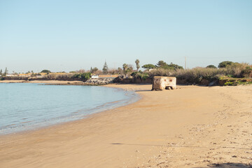 Fort or bunker on Micaela Beach in Chipiona. View of a solitary beach.