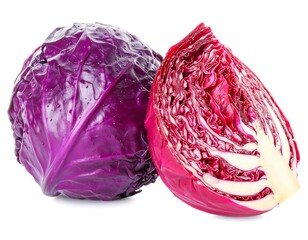 Two vibrant purple cabbages, one whole and one sliced, isolated on white