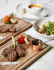 Western Fine Dining Set with Grilled Lamb Chops, Striploin Steak, Prawn Bisque Soup, and Fresh Salad