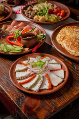 Delicious array of vibrant foods served on rustic dishes, perfect for a festive gathering