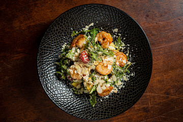 Fresh shrimp and kale mingle with sliced almonds for a delicious, healthy meal