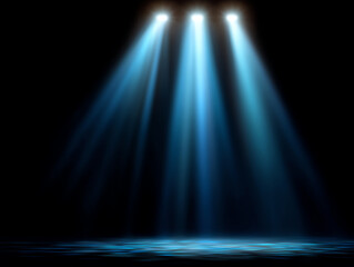 Three bright blue spotlights illuminate a dark stage, casting focused beams and creating a dramatic, theatrical atmosphere with a reflective floor surface