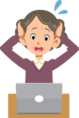 ノートパソンのトラブルに頭を抱える年配の女性
