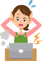 ノートパソンの故障に頭を抱えるエプロンをつけた女性
