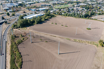 4K aerial drone photo of farmland with high voltage power transmission lines in Hillsboro Oregon,...