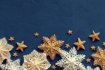 decoration on the blue vintage background. Paper snowflakes and golden stars. New year greeting card template. Holiday mock up. Scandinavian style.