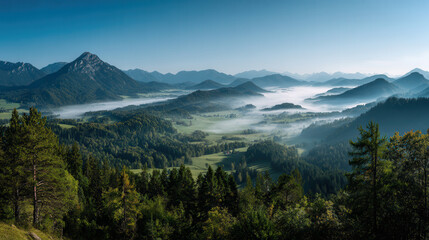 Obraz premium Beautiful morning landscape with fog over mountains and valleys in early sunrise