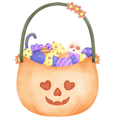 Pumpkin basket cute filled with colorful candies and treats.
