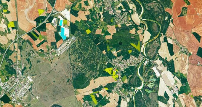 Flying above fertile land and soil, agricultural district. Camera is moving forward and left. Animation based on image by NASA