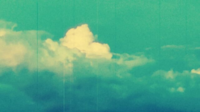 Blue sky and clouds retro style 8mm film look