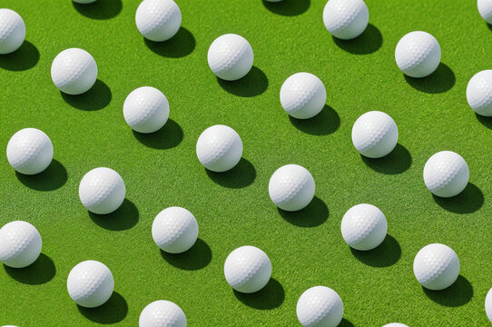 White Golf Balls Pattern on Green Turf, Top View