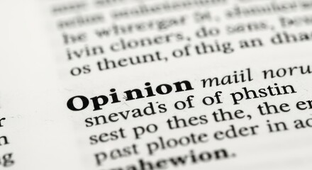 Fototapeta premium Close-up of a dictionary page, with the word 'Opinion' highlighted in bold text