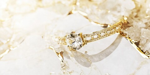 Diamond Ring on Textured Background: A sparkling diamond ring, its intricate gold setting gleaming, rests on a textured surface of white crystal.