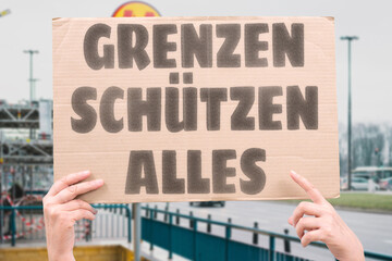 “Grenzen Schützen Alles” Borders guard more than land — they guard lives. BORDERS. PROTECTION. SECURITY. NATION. FUTURE. PEOPLE.