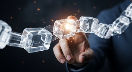 Hand touching glowing transparent blockchain link with orange sparks technology network