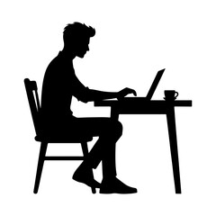 Silhouette of a man working on a laptop at a desk
