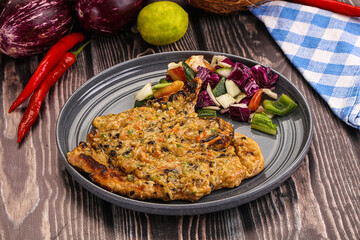 Tasty chicken steak with vegetables