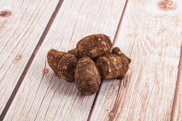 Brown topinambur roots for cooking