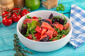 Salad with salmon and arugula
