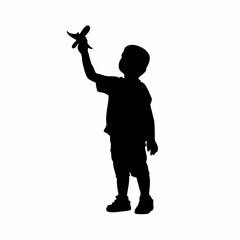 Silhouette of a boy playing with a toy airplane isolated on white background