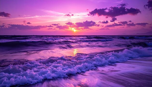 Pink sunset over ocean, foamy waves near