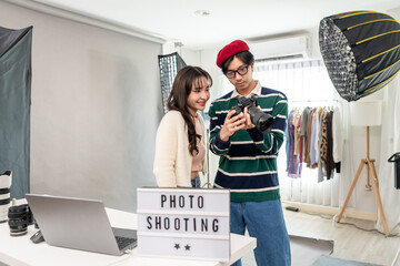 Behind the scenes of film crew collaborate on set under director's guidance.