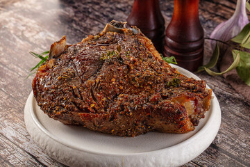 Baked beef steak on the bone