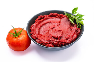 Fresh tomato paste or puree on a white background