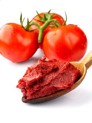 Fresh tomato paste or puree on a white background