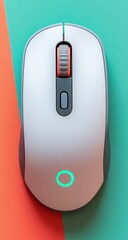 Top-down, sleek gray mouse with orange wheel on dual background