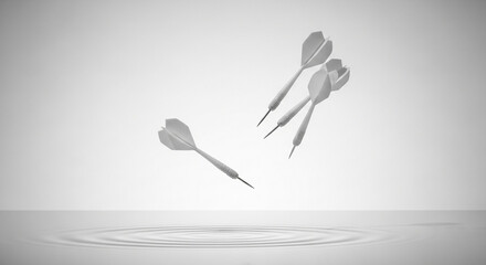 Three silver darts frozen in mid air above a reflective surface