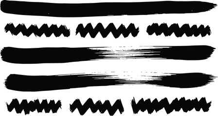 Obraz premium Black brush strokes and zigzag lines create a bold, artistic design element for graphic projects and creative compositions.