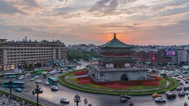 Xi'an Bell Tower Sunset Timelapse - Historic Chinese Landmark Day to Night Traffic Circle 4K