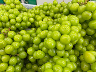 Green grape in the market. Close-up of green grapes.