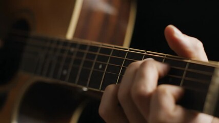 Acoustic guitar melody: Close-up demonstration of hand positions and finger dexterity on fretboard, creating harmonious music and rhythm, instrumental