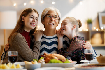 Family celebrating Thanksgiving Day