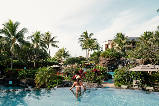 Girl in tropical pool
