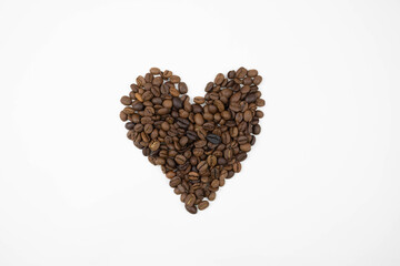 Cute heart of coffee beans on a white background