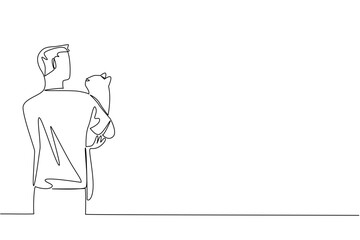 Continuous one line drawing rear view, a man in casual clothes hugging cat. Cat friendship with humans. Adorable behavior. International Hug Your Cat Day. Single line draw design vector illustration