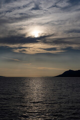 Sunset over the Adriatic coast of Croatia. Biokovo Mountains. Makarska.
