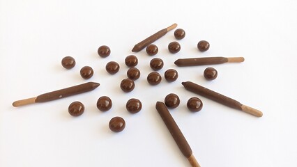 chocolate with nuts and chocolate stick isolated in white background