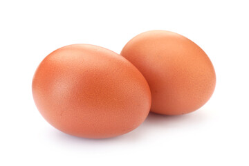 Two raw chicken eggs isolated on white