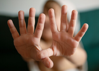 Close-up of a child&rsquo;s wrinkled hands after staying in water for a long time. Pruned skin on fingers, concept of bathing, swimming, skin hydration, childhood and health.